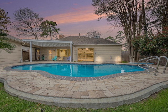 view of swimming pool with a fenced in pool, a patio area, and fence