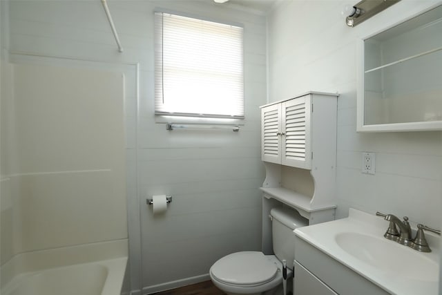 full bath with toilet, vanity, and shower / bathing tub combination