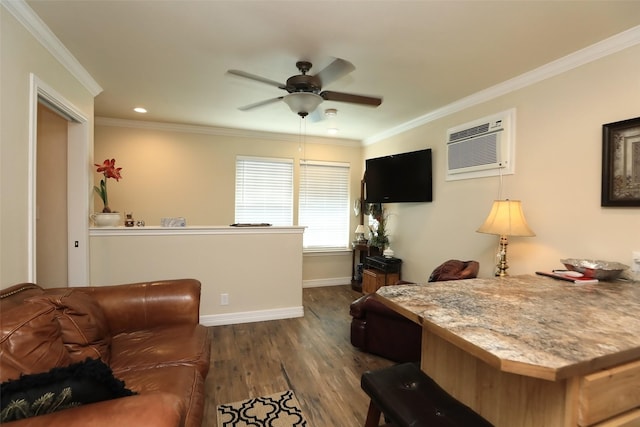 living area with crown molding, baseboards, dark wood-type flooring, a wall mounted AC, and a ceiling fan