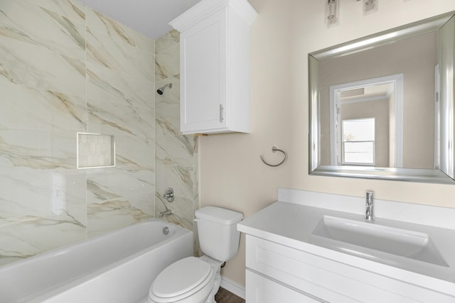 full bathroom featuring vanity, shower / bathing tub combination, and toilet