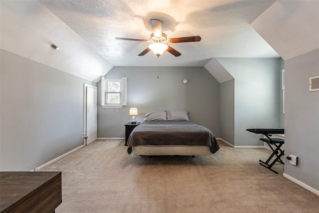 bedroom featuring baseboards, a textured ceiling, carpet flooring, and vaulted ceiling