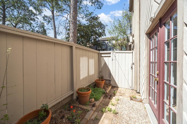 view of patio / terrace with a gate and fence