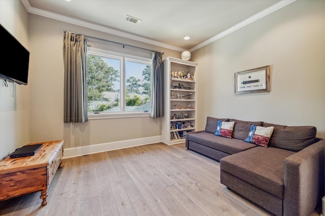 living area with visible vents, crown molding, baseboards, recessed lighting, and light wood-style floors