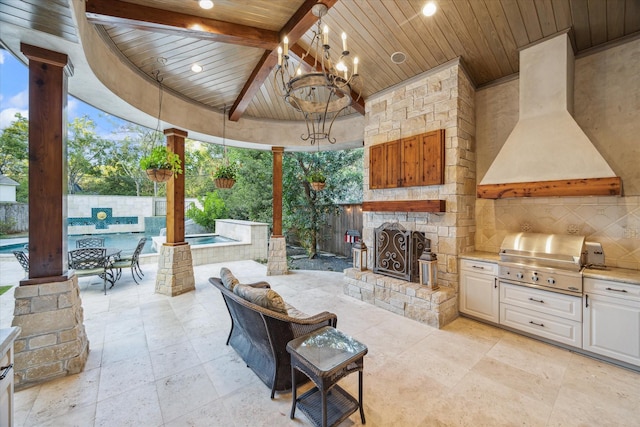 view of patio featuring a fenced backyard, grilling area, an outdoor stone fireplace, exterior kitchen, and a fenced in pool