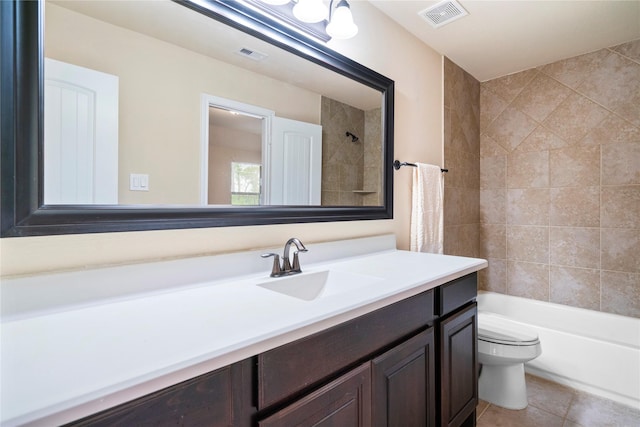 12530 Sharps Ln, Magnolia, TX 77354 - full bathroom featuring toilet, tile patterned flooring, vanity, and shower / tub combination