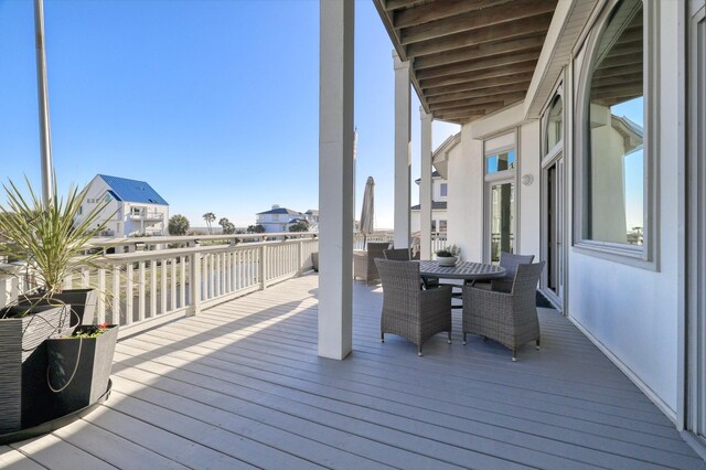 4206 Turks Pt, Galveston, TX 77554 - wooden terrace with outdoor dining area