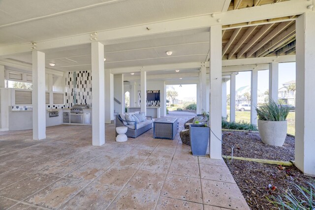4206 Turks Pt, Galveston, TX 77554 - view of patio / terrace featuring area for grilling, an outdoor kitchen, and outdoor lounge area