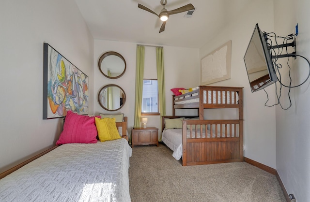 4206 Turks Pt, Galveston, TX 77554 - carpeted bedroom with baseboards, visible vents, and ceiling fan
