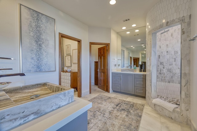 4206 Turks Pt, Galveston, TX 77554 - full bath with visible vents, walk in shower, recessed lighting, tile patterned floors, and vanity
