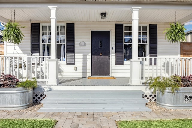 entrance to property with covered porch