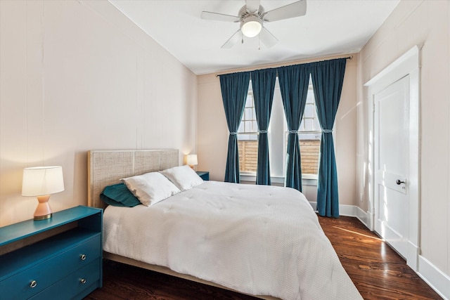 bedroom featuring dark wood-type flooring and ceiling fan