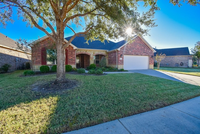 single story home featuring a front yard, a garage, brick siding, and driveway