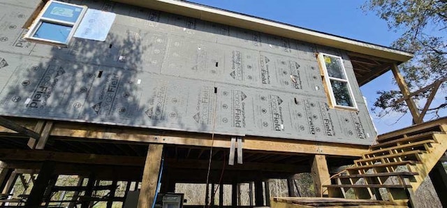 view of home's exterior with a carport