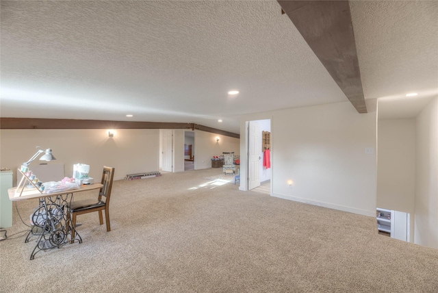 interior space with carpet flooring, recessed lighting, baseboards, and a textured ceiling