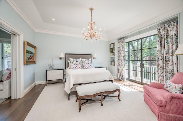 2131 Brentwood Dr, Houston, TX 77019 - bedroom with access to outside, a chandelier, baseboards, wood finished floors, and recessed lighting