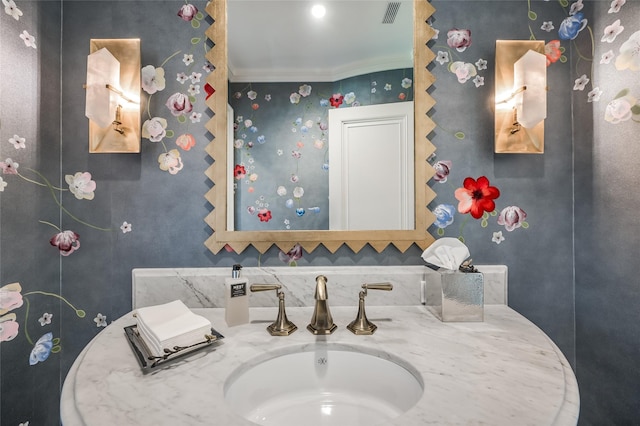 2131 Brentwood Dr, Houston, TX 77019 - bathroom with tasteful backsplash, ornamental molding, and vanity