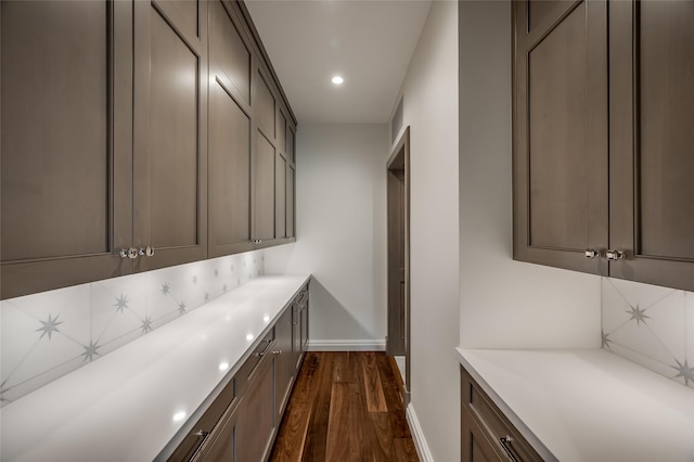 2131 Brentwood Dr, Houston, TX 77019 - bar with baseboards, recessed lighting, dark wood-style floors, and decorative backsplash
