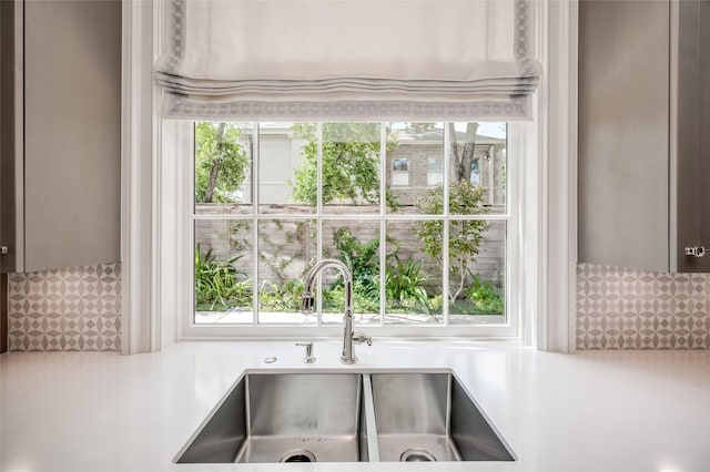 2131 Brentwood Dr, Houston, TX 77019 - kitchen view of a sink, decorative backsplash, and light countertops