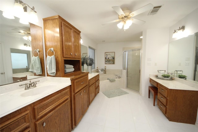 full bathroom with visible vents, vanity, a ceiling fan, a stall shower, and a garden tub
