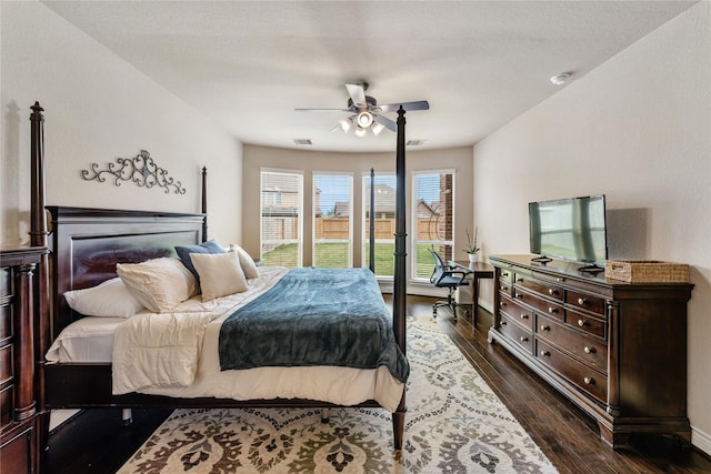 17131 Lumberton Dr, Cypress, TX 77433 - bedroom featuring dark wood-style flooring, ceiling fan, and baseboards