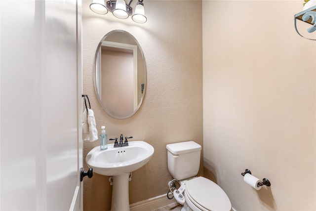 17131 Lumberton Dr, Cypress, TX 77433 - bathroom featuring toilet and baseboards