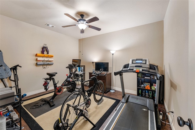 17131 Lumberton Dr, Cypress, TX 77433 - exercise area featuring a ceiling fan, baseboards, and wood finished floors