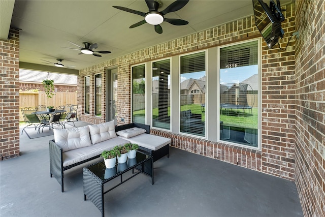 17131 Lumberton Dr, Cypress, TX 77433 - view of patio / terrace with a ceiling fan, outdoor dining area, fence, and outdoor lounge area