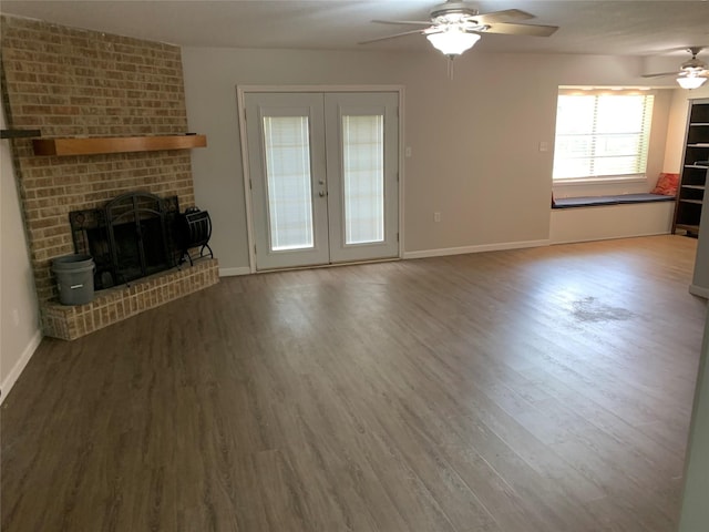 unfurnished living room with french doors, wood finished floors, baseboards, and ceiling fan