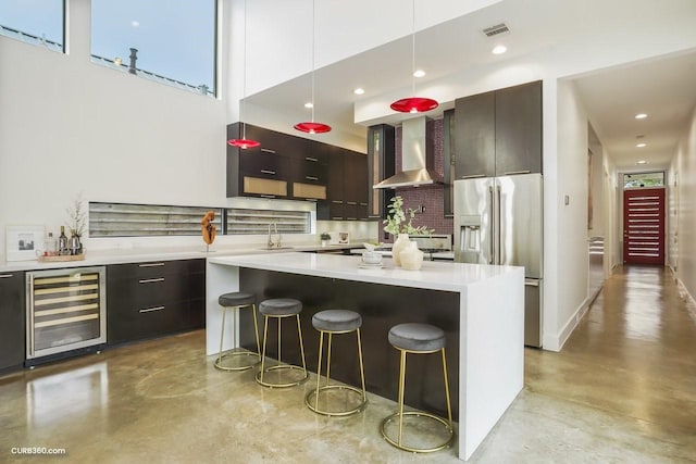 1035 Rutland St, Houston, TX 77008 - kitchen with wall chimney range hood, stainless steel refrigerator with ice dispenser, beverage cooler, finished concrete flooring, and modern cabinets