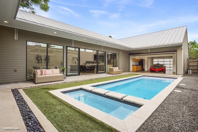 1035 Rutland St, Houston, TX 77008 - view of swimming pool featuring central air condition unit, a pool with connected hot tub, and a patio