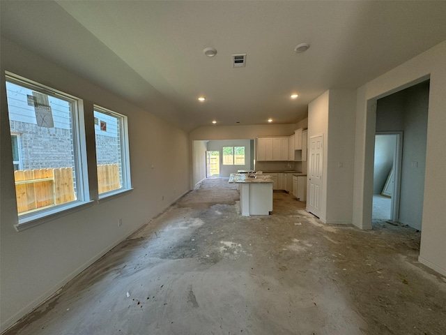 19122 Hazel Firs Ln, Magnolia, TX 77355 - unfurnished living room featuring recessed lighting