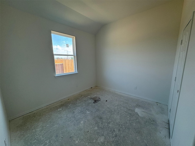 19122 Hazel Firs Ln, Magnolia, TX 77355 - spare room with vaulted ceiling and baseboards