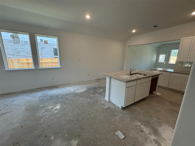 19122 Hazel Firs Ln, Magnolia, TX 77355 - kitchen featuring a sink, a kitchen island with sink, white cabinets, recessed lighting, and open floor plan