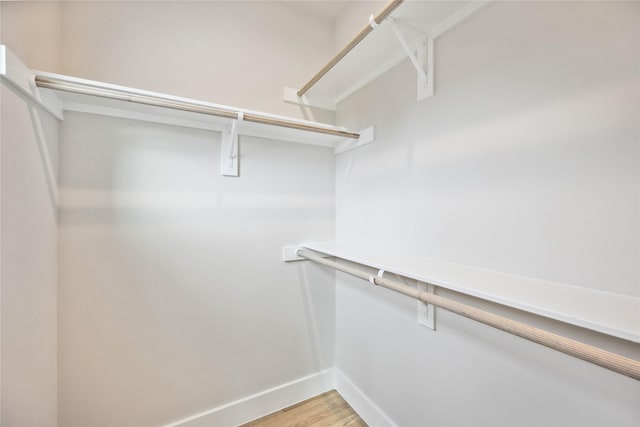walk in closet featuring light wood-type flooring