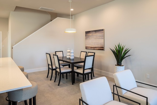 dining area featuring visible vents, baseboards, a baseboard radiator, and recessed lighting