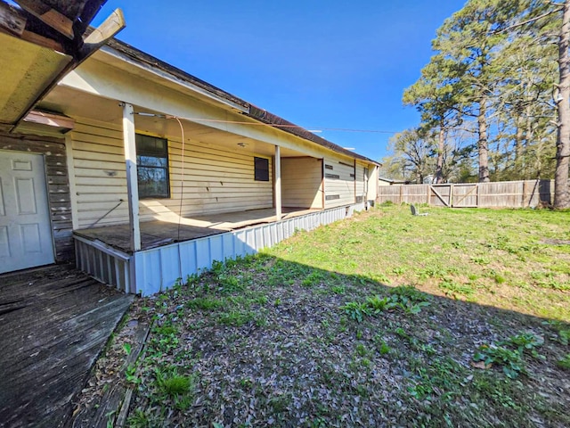 view of yard featuring a patio and fence