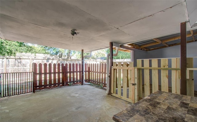 view of patio / terrace featuring fence