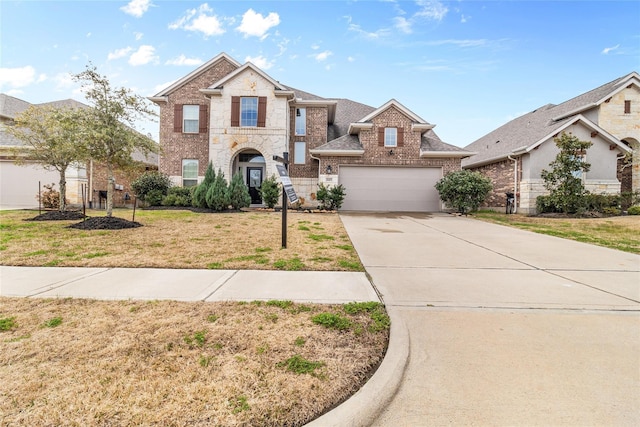 view of front of house featuring stone siding, brick siding, concrete driveway, and a front yard