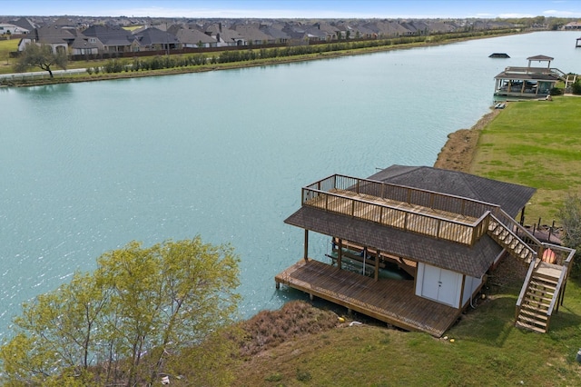 27003 Skiers Crossing Dr, Katy, TX 77493 - dock with stairway, a deck with water view, and a residential view