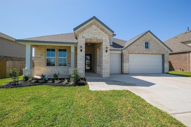 view of front of property featuring a garage, a front yard, brick siding, a shingled roof, and concrete driveway