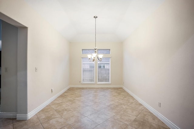 155 Forest Heights Ln, Montgomery, TX 77316 - unfurnished dining area with an inviting chandelier, light tile patterned flooring, baseboards, and lofted ceiling