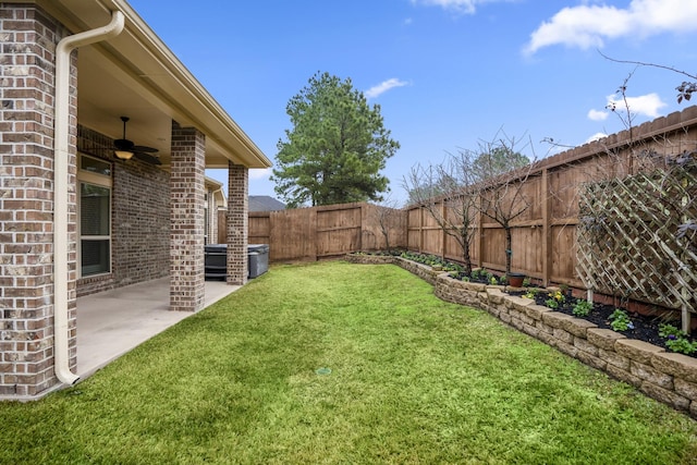 155 Forest Heights Ln, Montgomery, TX 77316 - view of yard featuring a fenced backyard, a ceiling fan, and a patio area
