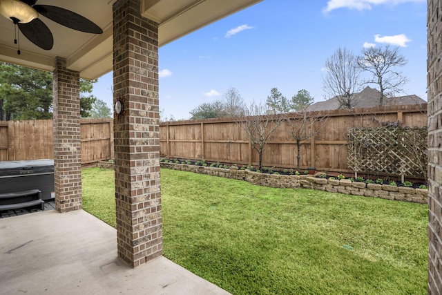 155 Forest Heights Ln, Montgomery, TX 77316 - view of yard with a patio, a fenced backyard, a ceiling fan, and a hot tub