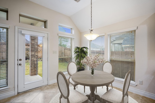 155 Forest Heights Ln, Montgomery, TX 77316 - dining area with light tile patterned floors, baseboards, and vaulted ceiling