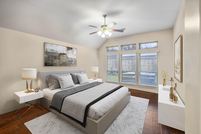155 Forest Heights Ln, Montgomery, TX 77316 - bedroom with a ceiling fan, vaulted ceiling, wood finished floors, and baseboards