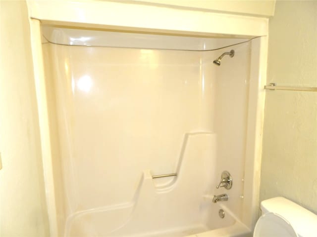 full bath with  shower combination and toilet