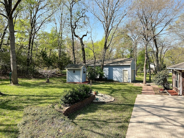 518 Lcr 902, Jewett, TX 75846 - view of yard with a storage unit and an outbuilding