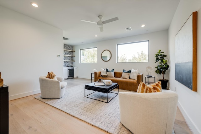 1609 Park St, Houston, TX 77019 - living room with wood finished floors, a ceiling fan, baseboards, recessed lighting, and wine cooler