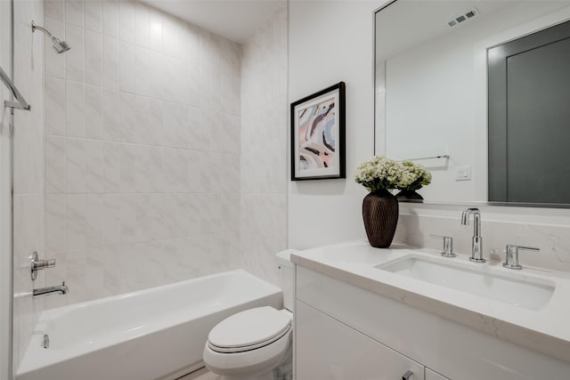 1609 Park St, Houston, TX 77019 - full bathroom with vanity, toilet, and shower / bathtub combination