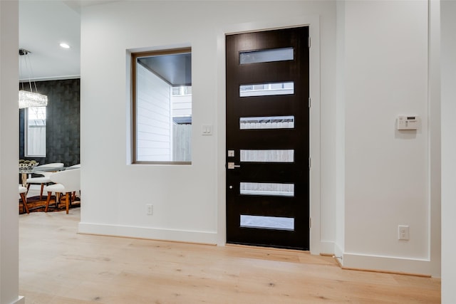 1609 Park St, Houston, TX 77019 - foyer entrance featuring wood finished floors and baseboards